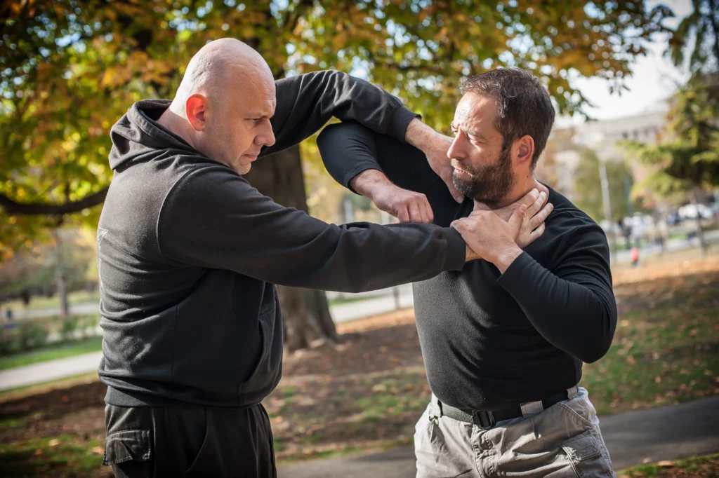 Two men fighting.